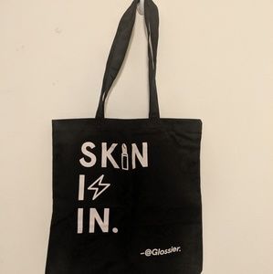 glossier skin is in tote bag